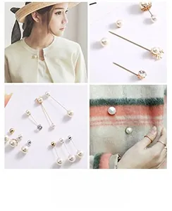 Detailed view of pearl brooches and gold scarf pins for cardigan and neck accessories
