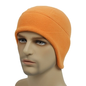 Detail view of bright orange fleece thermal cycling cap with ear protection on head model