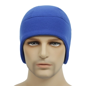 Detailed view of the soft blue fleece fabric and ear protection design of this winter beanie