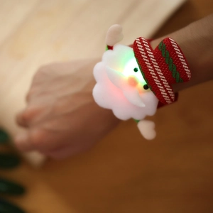 Luminous Christmas wristband featuring a glowing Santa Claus design on a child's wrist