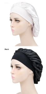 Detail showing white and black wide elastic band satin sleeping bonnets for hair care