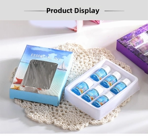 Detailed view of six 3ml water-soluble ocean essential oil bottles in a blue gift box