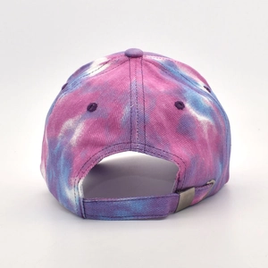 Close-up of the tie-dye baseball cap's adjustable back strap and metal buckle detail