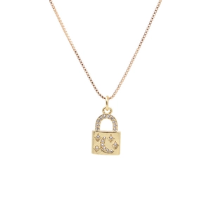Golden necklace with zircon-encrusted key lock pendant featuring moon and star patterns