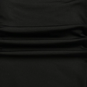 Macro shot of black pleated stretch fabric texture for sexy deep V-neck jumpsuits