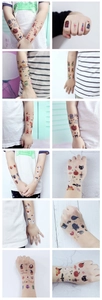 Detailed view of kids' Halloween temporary tattoos with pumpkin and ghost patterns