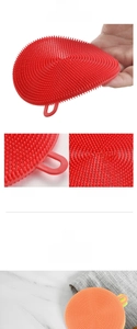 Detail of soft silicone dish brush with dense bristles and hanging hole for easy storage
