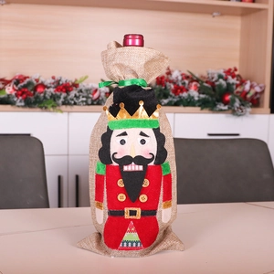 Nutcracker Christmas wine bottle cover made of burlap with festive holiday table decor