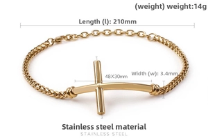 Detailed macro view of gold stainless steel curb chain with a large cross charm