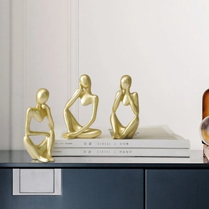 Set of 3 minimalist golden thinker sculptures for modern home and office decoration