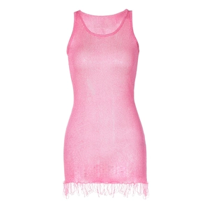 Detail of pink knit sleeveless bodycon dress with glitter texture and fringe hemline