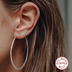 S925 sterling silver hoop earrings and turquoise stud set shown on model ear