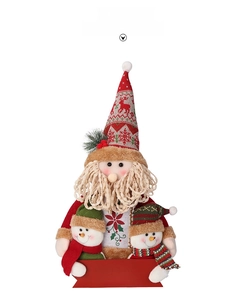 Detail of plush Santa Claus doll holding snowmen and Merry Christmas sign