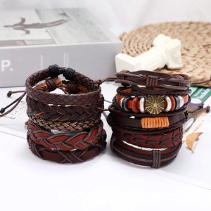 Retro multi-layer brown leather bracelet set with metallic star beads and braided texture