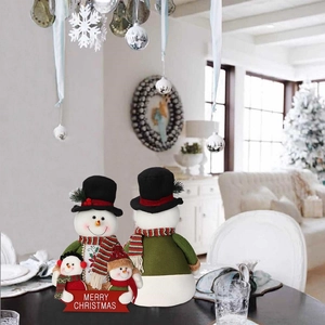 Christmas snowman plush decoration with hat and scarf in a cozy festive home setting