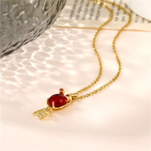 Gold-plated goldfish necklace with red stone pendant and white zircon accents