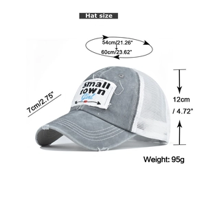 Detailed view of grey washed cotton ponytail cap with small town Girl embroidery and mesh