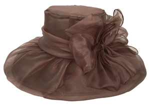 Detail view of large organza flower and sheer texture on wide brim sun hat