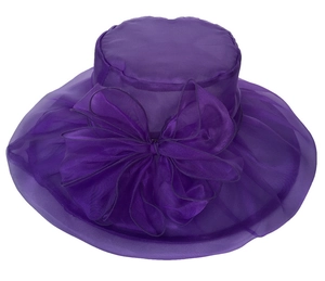 Detail of the oversized organza bow on a purple wide-brim sun hat for formal events