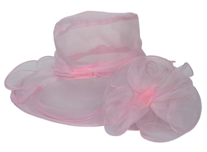 Detail of light pink organza sun hat with wide brim and large floral decoration