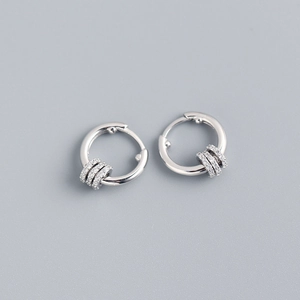 Macro shot of silver S925 hoop earrings with three detachable pave crystal beads