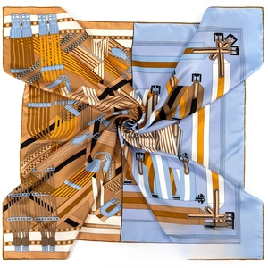 Detailed view of hand-rolled edges on twill silk square scarf with equestrian strap prints