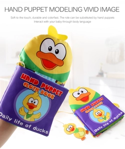 Detailed hand puppet cloth book with soft yellow duck design and purple fabric handle