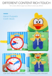 Interactive baby cloth book with a yellow duck puppet, zipper detail, and clock for learning