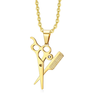 Golden stainless steel scissors and comb pendant necklace with clear rhinestone accent