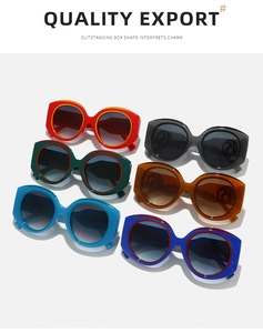 Detailed flat lay of trendy plastic sunglasses in six vibrant colors with thick frames