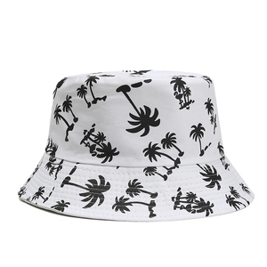 White bucket hat with black palm tree pattern for outdoor travel and sun protection