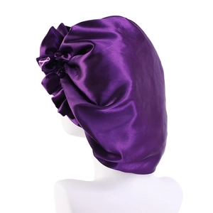 Double-layered purple satin sleep bonnet with large bow and ruffled lace edge for hair care