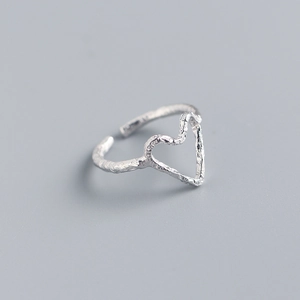 Detailed view of the irregular tin foil texture on the S925 sterling silver heart ring