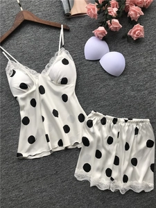 Polka dot satin sleepwear set with lace trim and V-neck camisole top for women