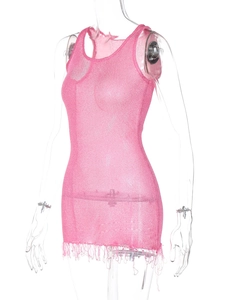 Detailed macro view of pink mesh fabric texture and fringe hem on sleeveless dress