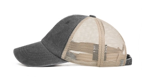Detailed side view of breathable mesh trucker hat with dark grey canvas and khaki back