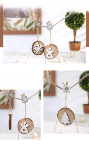 Detailed view of handcrafted wooden Christmas ornaments with snowflake and angel carvings