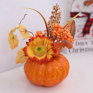 Artificial foam pumpkin centerpiece with sunflowers and autumn berries for fall home decor