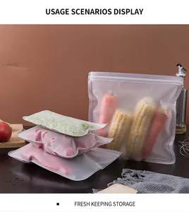 Reusable EVA food storage bags containing fresh vegetables in a kitchen setting