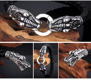 Macro detail of braided leather bracelet with twin dragon head stainless steel clasps