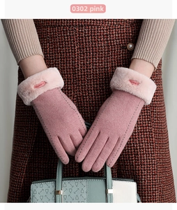 Pink winter wool gloves for women featuring plush faux fur cuffs and touchscreen detail