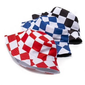 Reversible checkerboard bucket hats in red, blue, and black for sun protection and style