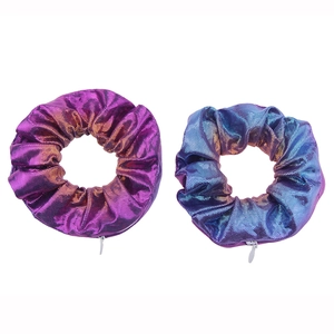 Detail of laser gradient hair scrunchies with metallic finish and hidden zipper pocket