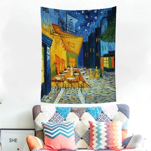 Detailed view of Van Gogh Cafe Terrace at Night wall tapestry in a cozy living room decor