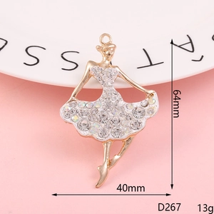 Macro detail of ballerina pendant with dimensions 64mm by 40mm and rhinestone skirt
