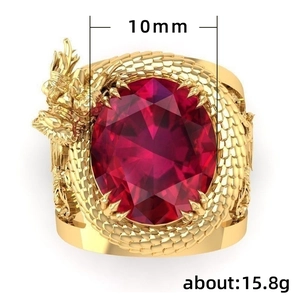 Anillo de dragón dorado con gema roja ovalada y grabado detallado de escamas