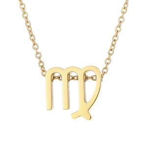 Macro detail of Virgo zodiac pendant in gold-plated stainless steel with mirror finish