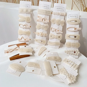 Elegant Korean style pearl hair clip set with various geometric shapes in white and gold