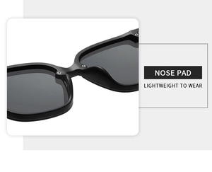 Détail des plaquettes de nez intégrées sur lunettes de soleil carrées noires légères