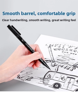 Close-up of waterproof graphic pen tip sketching fine lines on paper for professional art
